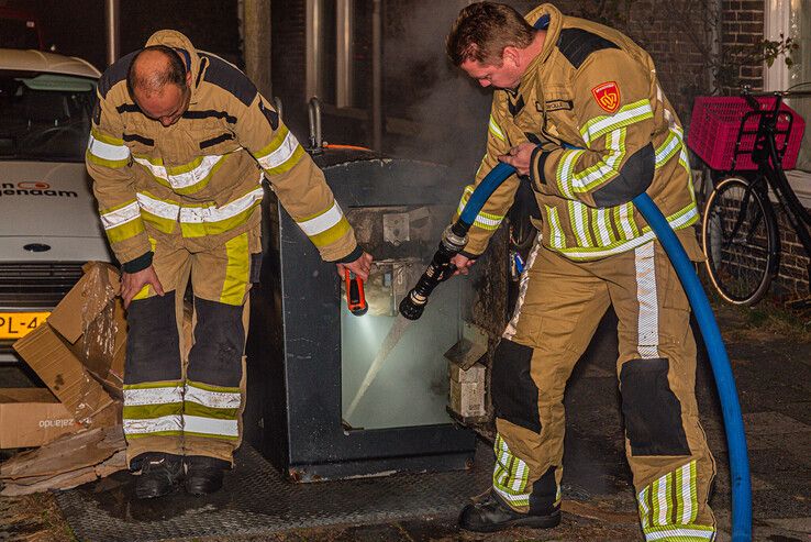 Brand in ondergrondse container in Assendorp - Foto: Peter Denekamp