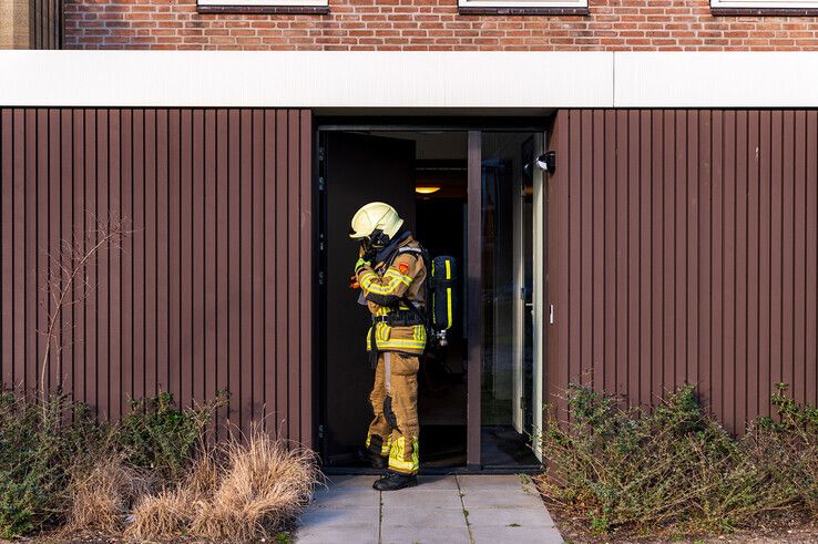 Voor de vierde keer brand gesticht in flat aan Middelweg - Foto: Peter Denekamp