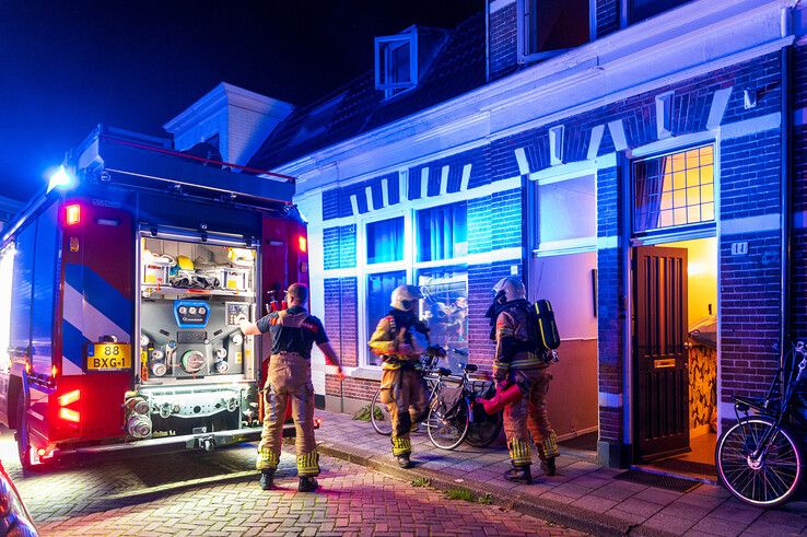 Verwarde man aangehouden na brandstichting in zorgwoning in Assendorp - Foto: Peter Denekamp