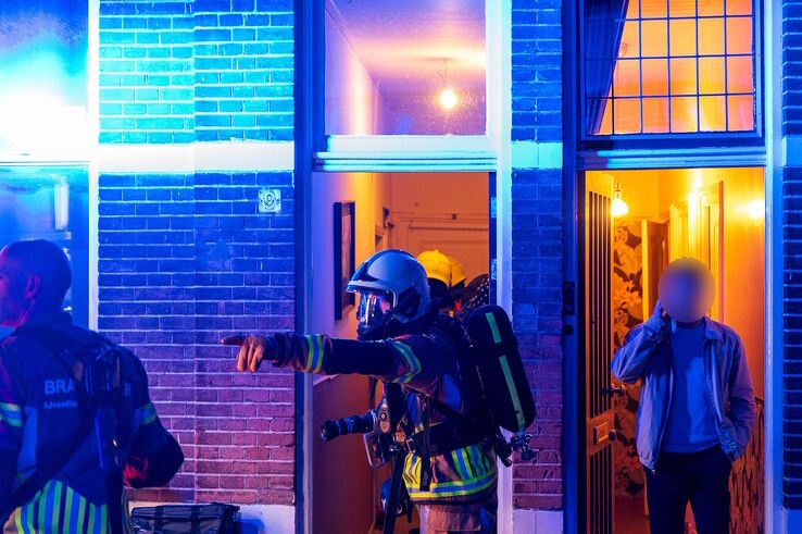 Verwarde man aangehouden na brandstichting in zorgwoning in Assendorp - Foto: Peter Denekamp