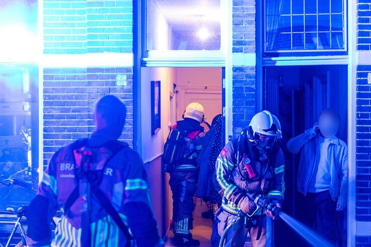 Verwarde man aangehouden na brandstichting in zorgwoning in Assendorp - Foto: Peter Denekamp