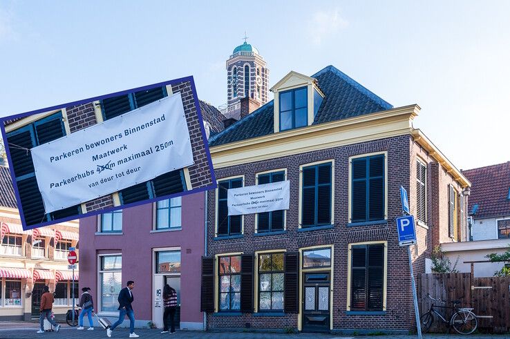 Een spandoek op de Eekwal met zorgen van een aantal bewoners - Foto: Peter Denekamp