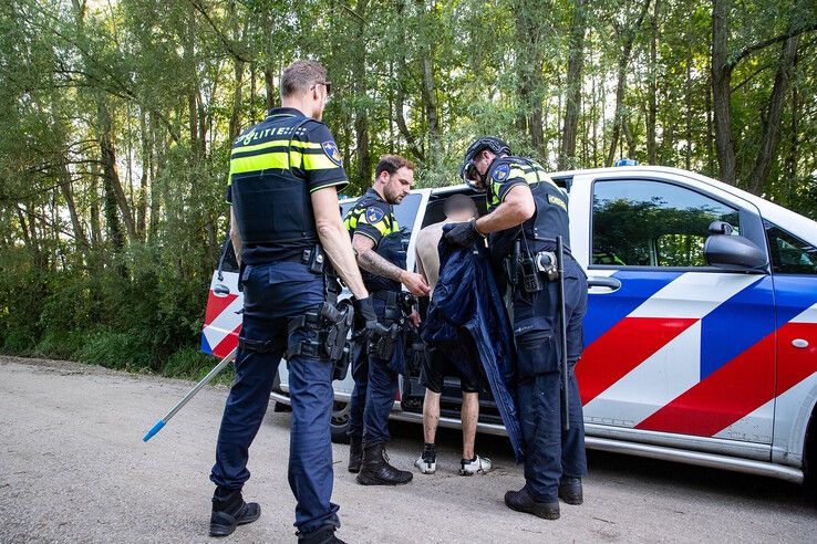 Verdachte springt water in op vlucht voor politie in Zwolle, Kampenaar en Enschedeër aangehouden